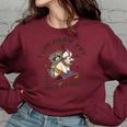 Racoonicorn Women's Sweatshirt | Whimsical Trash Panda Design Maroon
