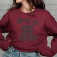 Sweet But Will Throw Hands Raccoon Sarcastic Women's Oversized Sweatshirt Maroon