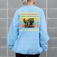 Retro Angry Raccoon Sweatshirt—Women's Oversized Back Print Light Blue