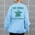 Sarcastic Raccoon Cowboy Oversized Sweatshirt for Women | Rustic Vibes Light Blue