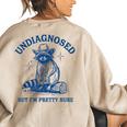 Undiagnosed But I'm Pretty Sure Cowboy Raccoon Meme Women's Oversized Sweatshirt Back Print Sand
