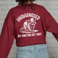 Cowboy Raccoon Women's Oversized Sweatshirt - Quirky Back Print Maroon