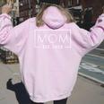 1St Time Mom Est 2025 New First Mommy 2025 Women Oversized Hoodie Back Print Light Pink