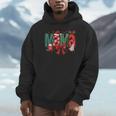 Coquette Bow Christmas Mama Candy Cane Santa Hot Cocoa Mom Premium Unisex Hoodie
