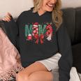Coquette Bow Christmas Mama Candy Cane Santa Hot Cocoa Mom Premium Unisex Hoodie