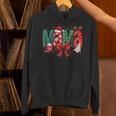 Coquette Bow Christmas Mama Candy Cane Santa Hot Cocoa Mom Premium Unisex Hoodie